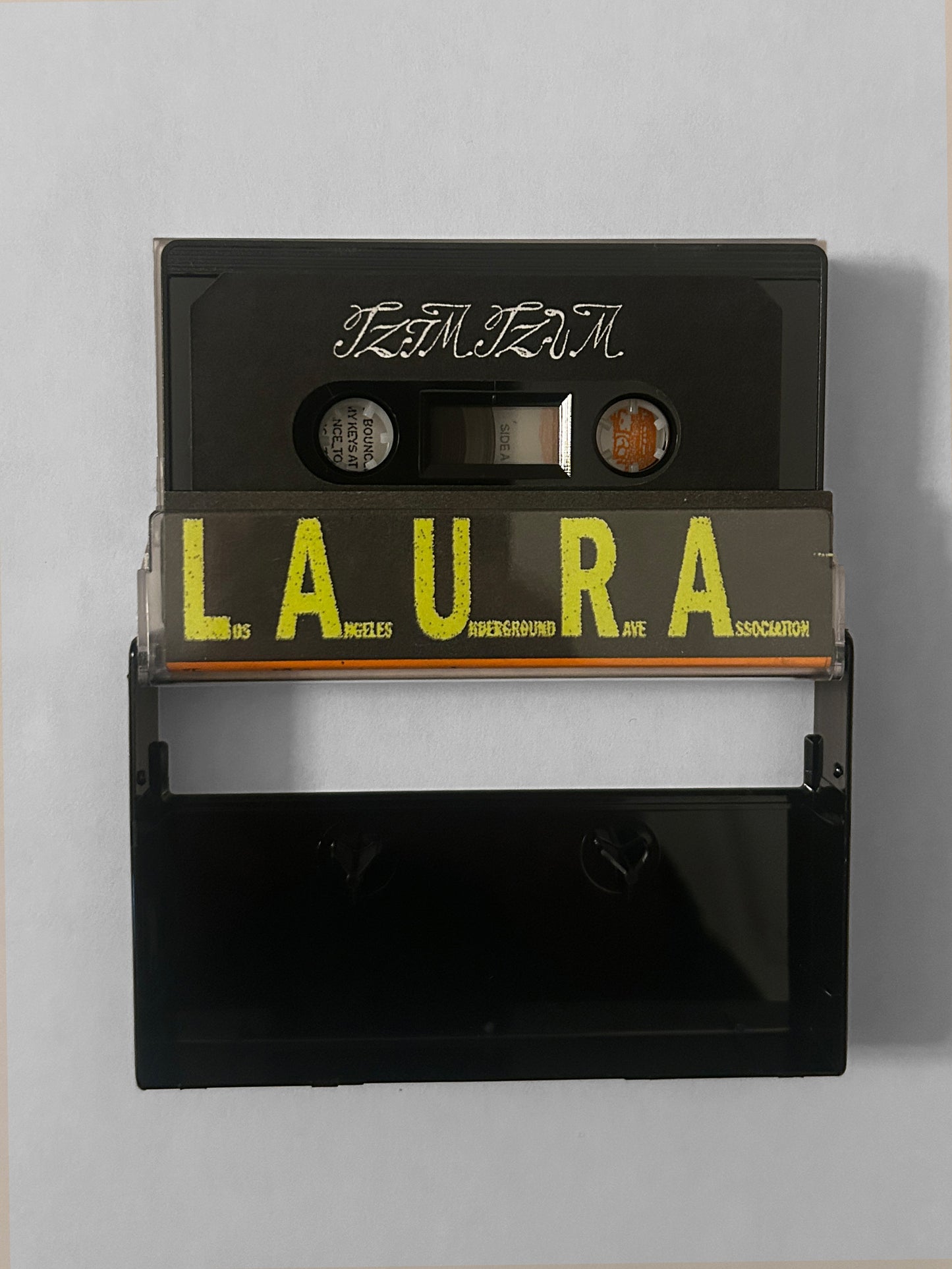 L.A.U.R.A. 013: Tzimtzum - The Cops Are Here Cassette